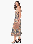 Halter midi dress, orange, black, and beige palm tree print. A-line silhouette.