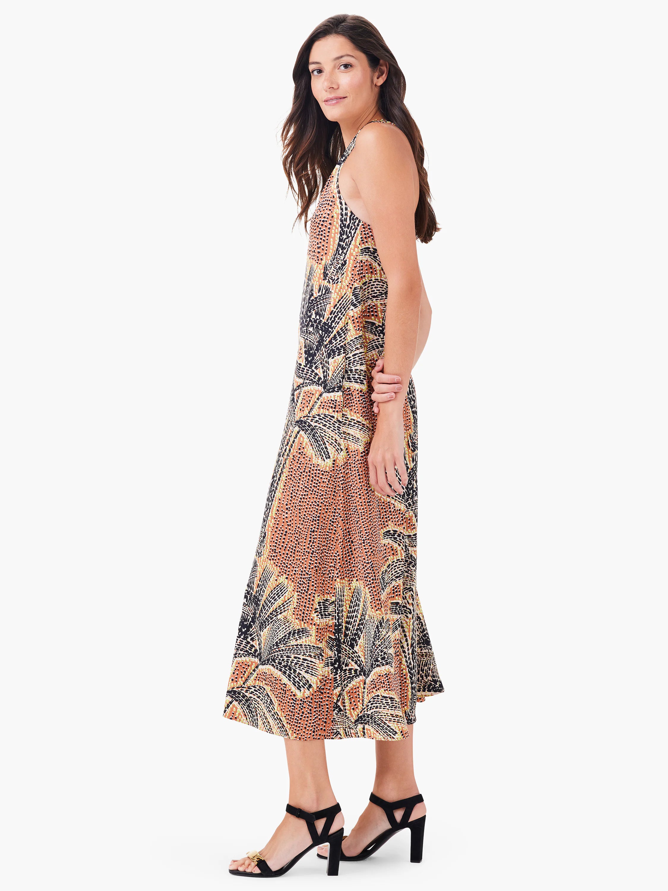 Halter midi dress, orange, black, and beige palm tree print. A-line silhouette.