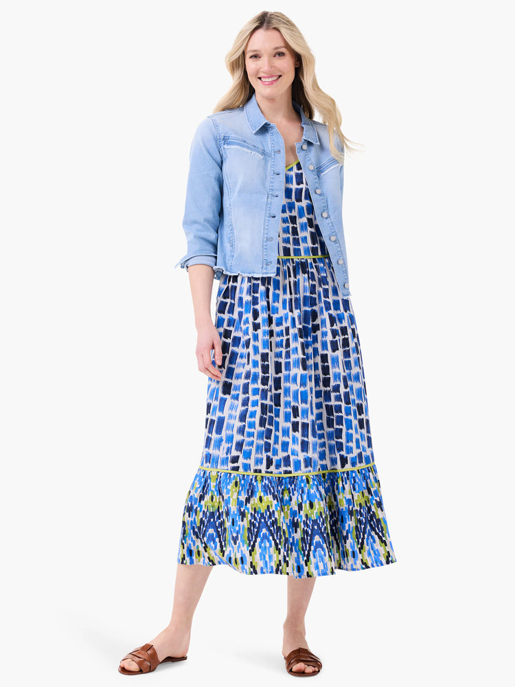 Midi dress, blue, white, & green brushstroke pattern.  Tiered bottom. Light blue denim jacket.