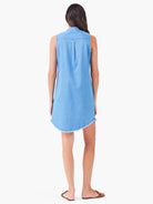 Here's alt text under 125 characters:

Light blue denim sleeveless shirt dress,  raw hemline.  Shown from the back.