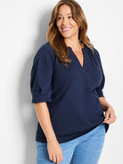 Navy blue, textured knit top.  V-neck, 3/4 sleeves.