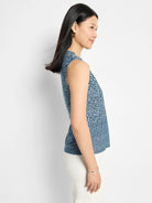 Sleeveless knit tank top; blue and white geometric pattern.