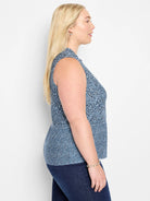 Sleeveless knit tank; blue and white geometric pattern.