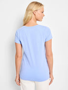 Light blue short-sleeve crew neck t-shirt, smooth knit, shown from the back.