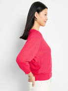 Pink, V-neck, 3/4 sleeves, cotton knit sweater.