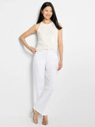 Off-white sleeveless sequined sweater tank; sequins concentrated in lower half.
