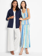 Knit tank; multicolored vertical stripes of blue, yellow, and white.  Sleeveless.