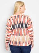 Here's alt text for the image, under 125 characters:

"Crisscross cotton sweater, rear view.  Features a cream base with...