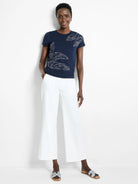 Navy blue short-sleeve tee with silver leaf design.