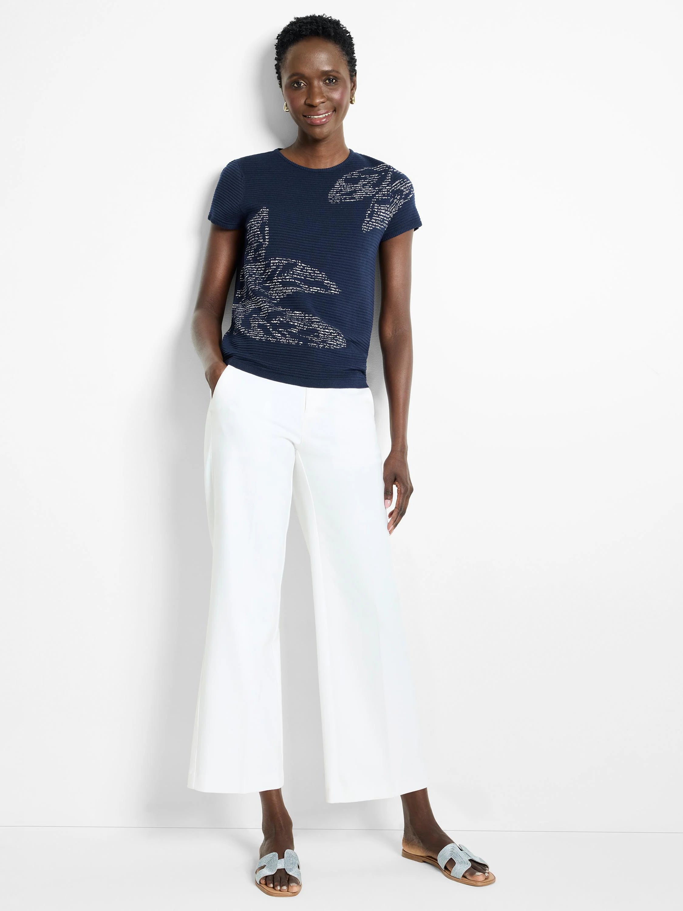 Navy blue short-sleeve tee with silver leaf design.