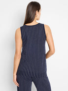 Navy blue sleeveless knit tank with thin white vertical stripes.  The back is shown.