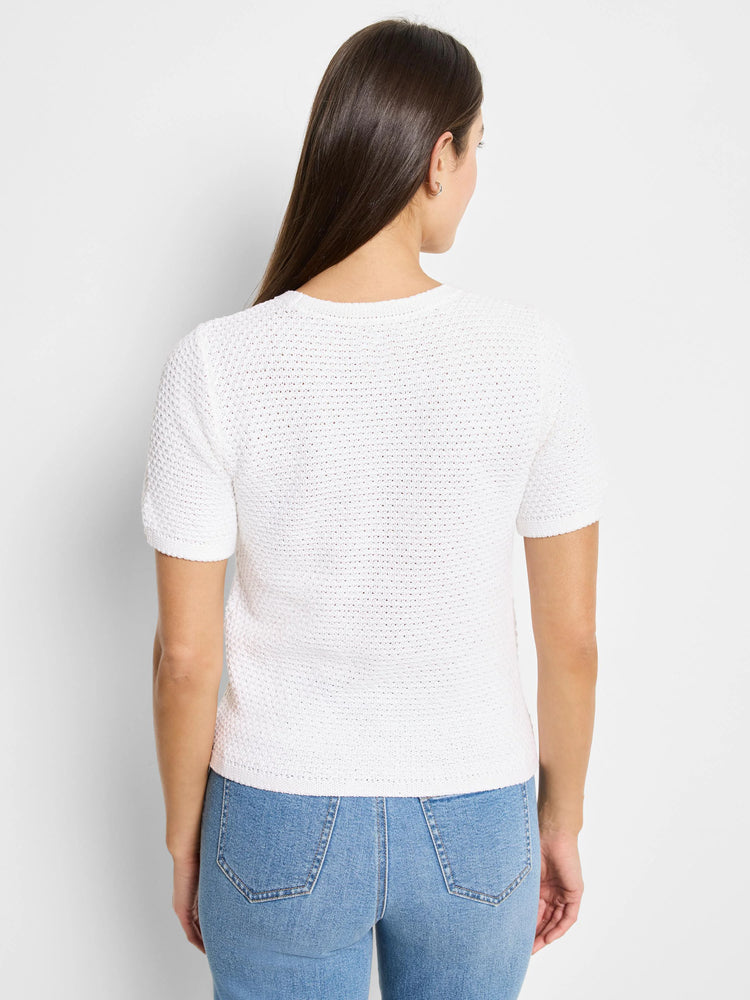 White short-sleeve knit sweater tee with textured fabric.  Shown from the back.