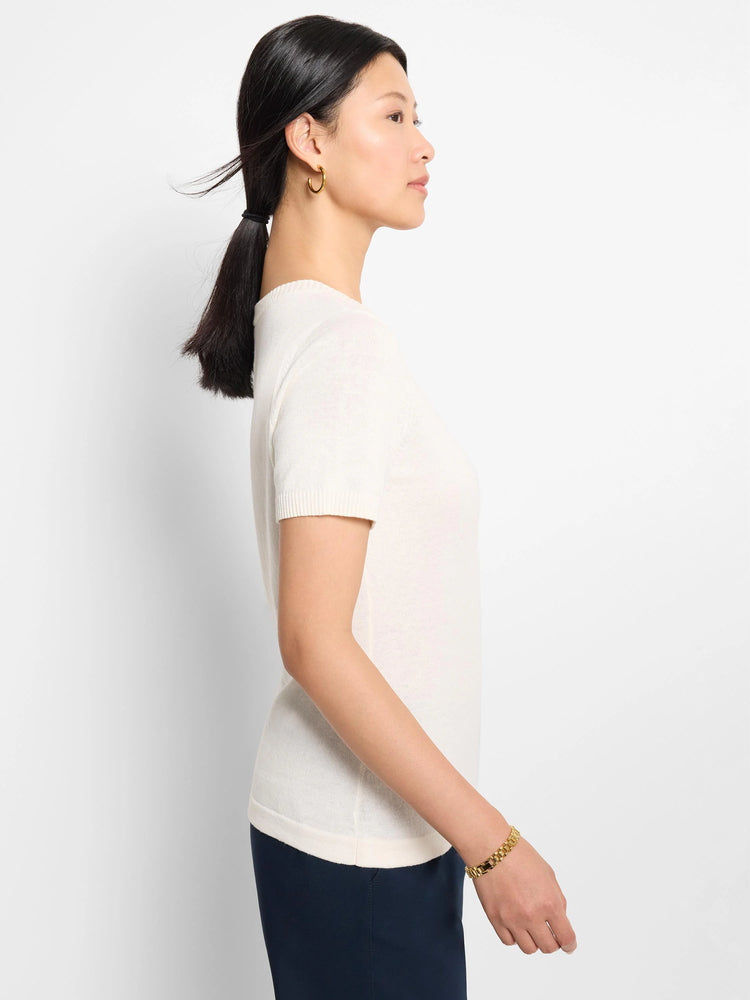 Off-white scoop neck short-sleeve cotton sweater tee.