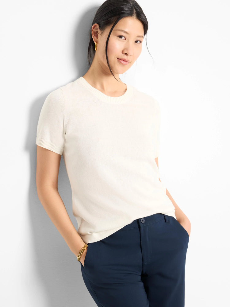 Off-white scoop neck short-sleeve cotton sweater tee.