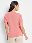 Pink scoop-neck cotton sweater tee with short sleeves; shown from the back.