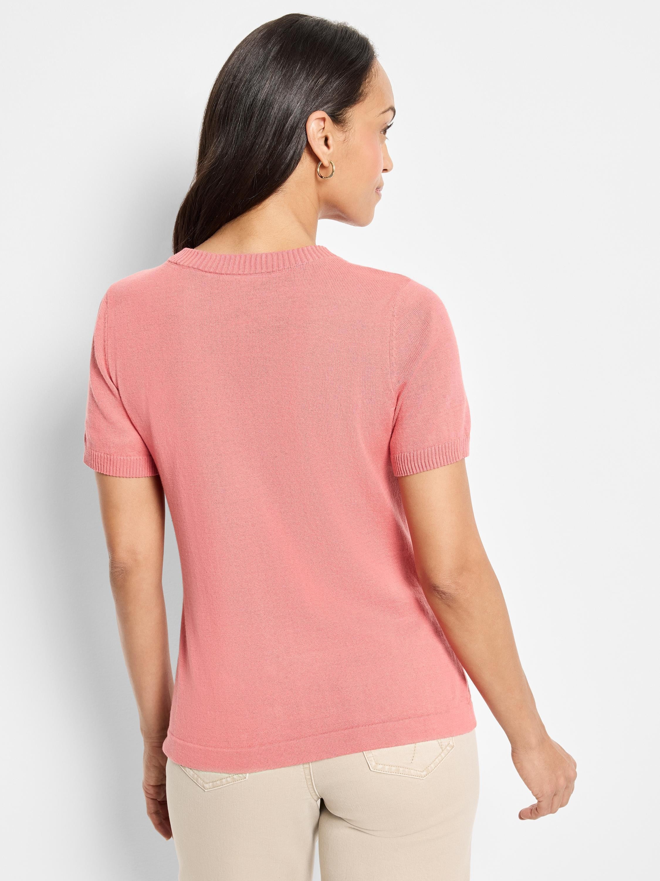 Pink scoop-neck cotton sweater tee with short sleeves; shown from the back.