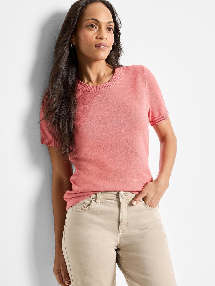 Pink cotton sweater tee with short sleeves and scoop neck.