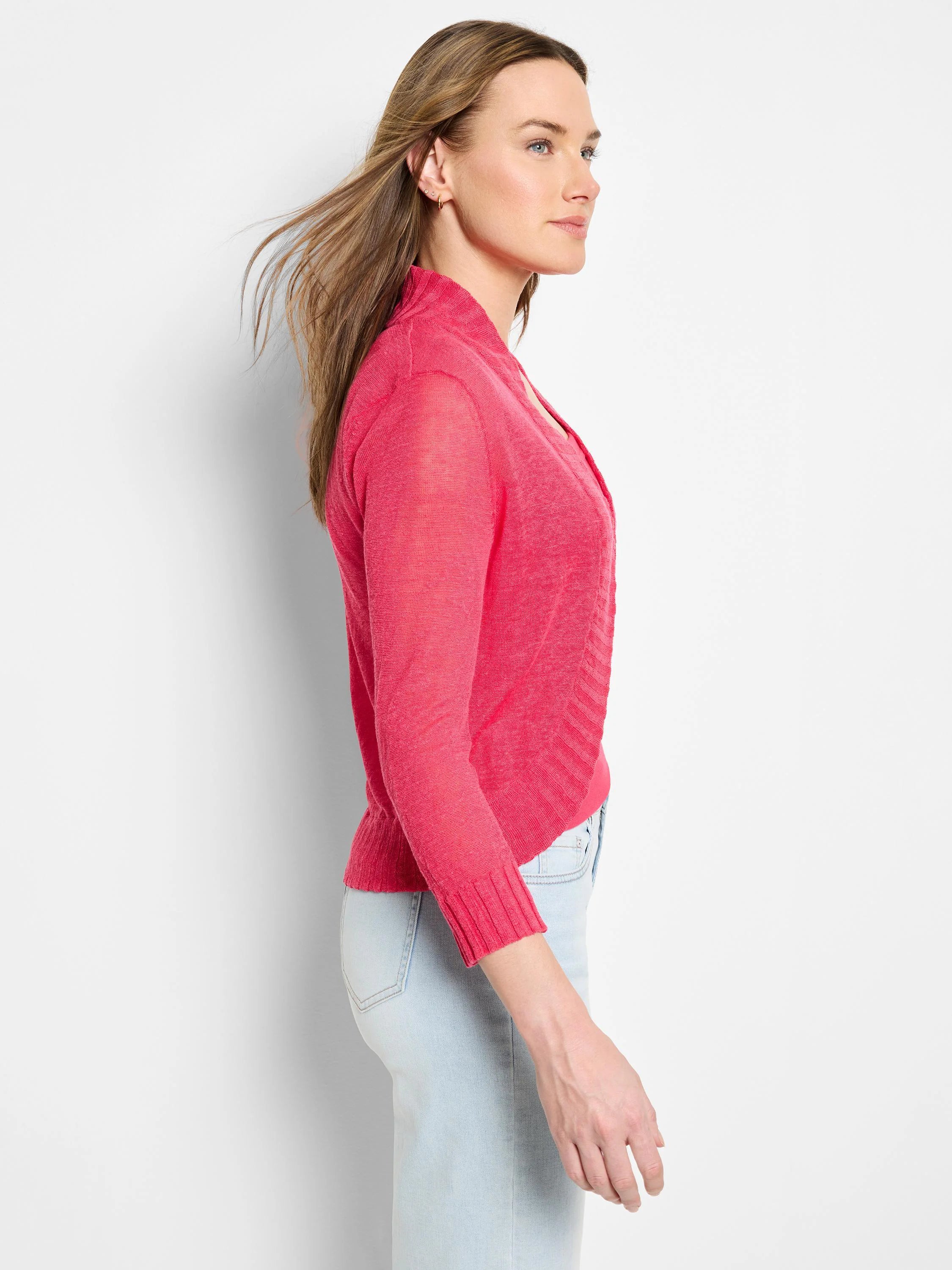 Bright pink bolero cardigan with long sleeves, open front, and ribbed cuffs. Lightweight knit.