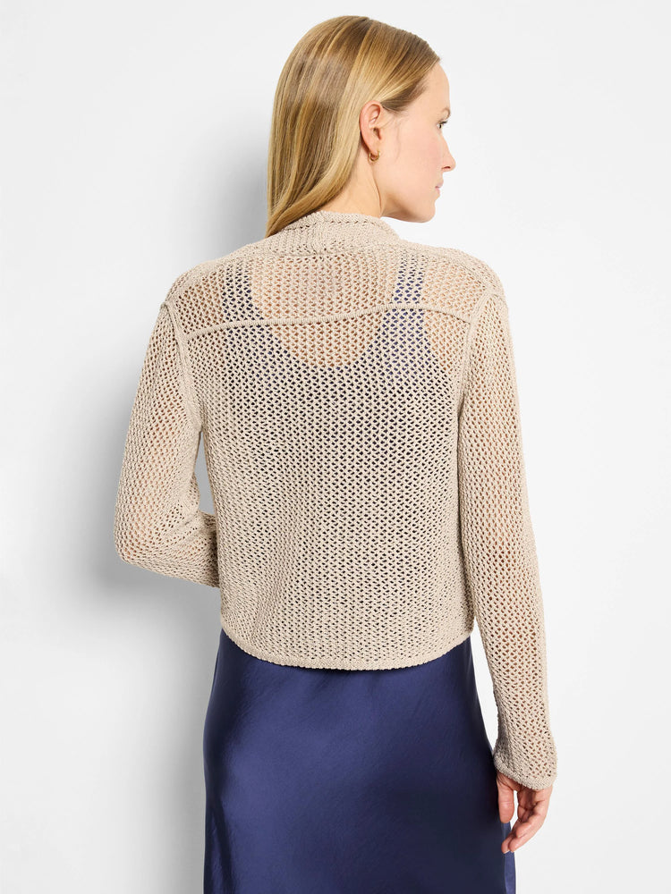 Beige open-knit mesh cocoon cardigan, cropped. Back view on model, showing dark blue underlayer.