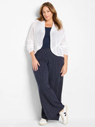 White mesh cocoon cardigan, open-front, with a visible open weave and draped fit.