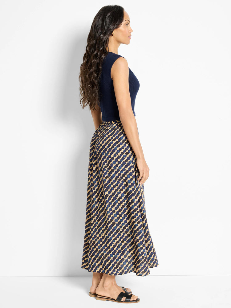 Here's alt text for the image, under 125 characters:

"Pebble Dream dress:  Beige maxi skirt with dark blue pebble...
