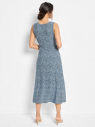 Sleeveless midi dress, blue and white geometric print.  Hem features a slightly different pattern.