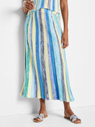 Knit midi skirt with vertical stripes in blues, greens, and pale yellow. Pleated.