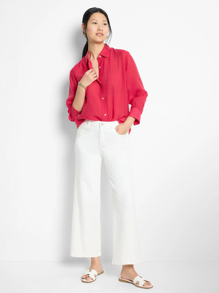 Pink linen shirt, long sleeves, button-down front.