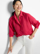 Pink, collared, 3/4 sleeve button-down shirt.  Slight A-line shape.