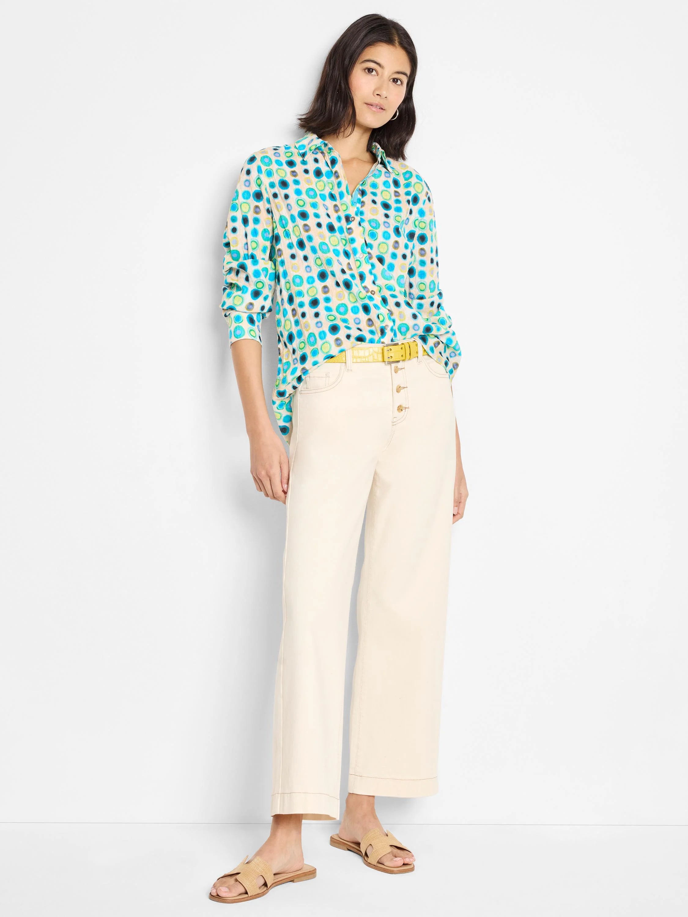 Cotton shirt, off-white background with teal, green, and dark blue scattered circles. Long sleeves.
