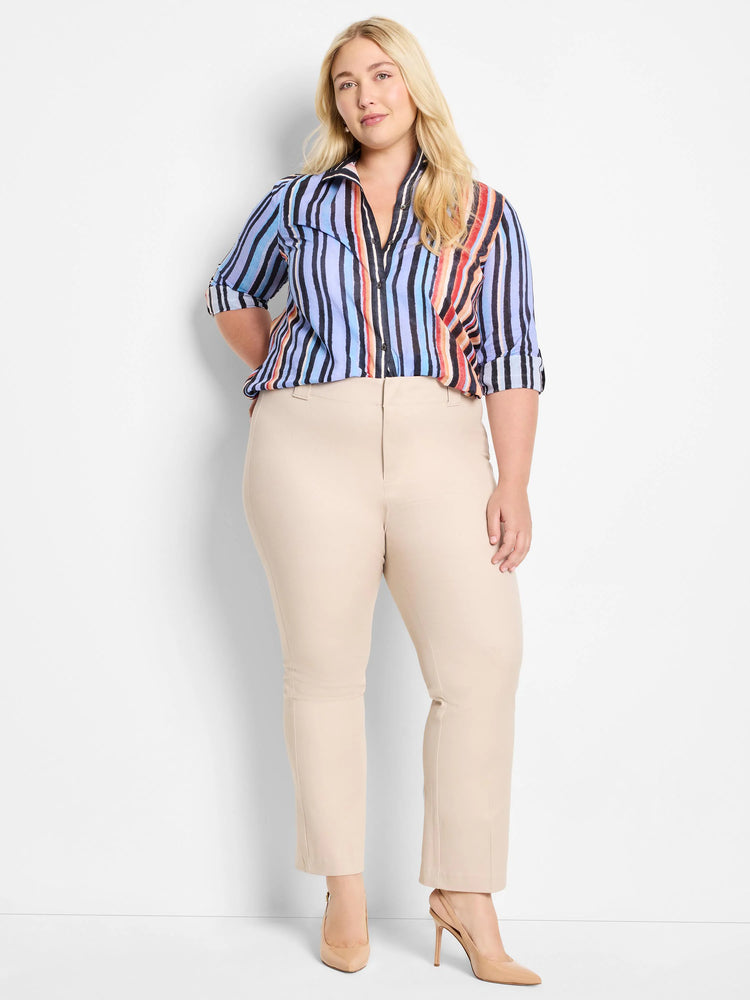 Multicolored vertical stripes on a light blue cotton shirt.  The stripes include black, orange, red, and other muted tones.