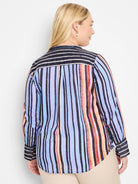 Here's alt text for the image, keeping it concise and descriptive for visually impaired users:

"Cotton shirt; vertical...