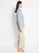 Cotton shirt; light blue background with pastel pink, blue, and peach abstract blocks. Long sleeves.