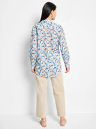 Here's alt text for the image, under 125 characters:

>Back view of a long-sleeve cotton shirt.  Light blue background...