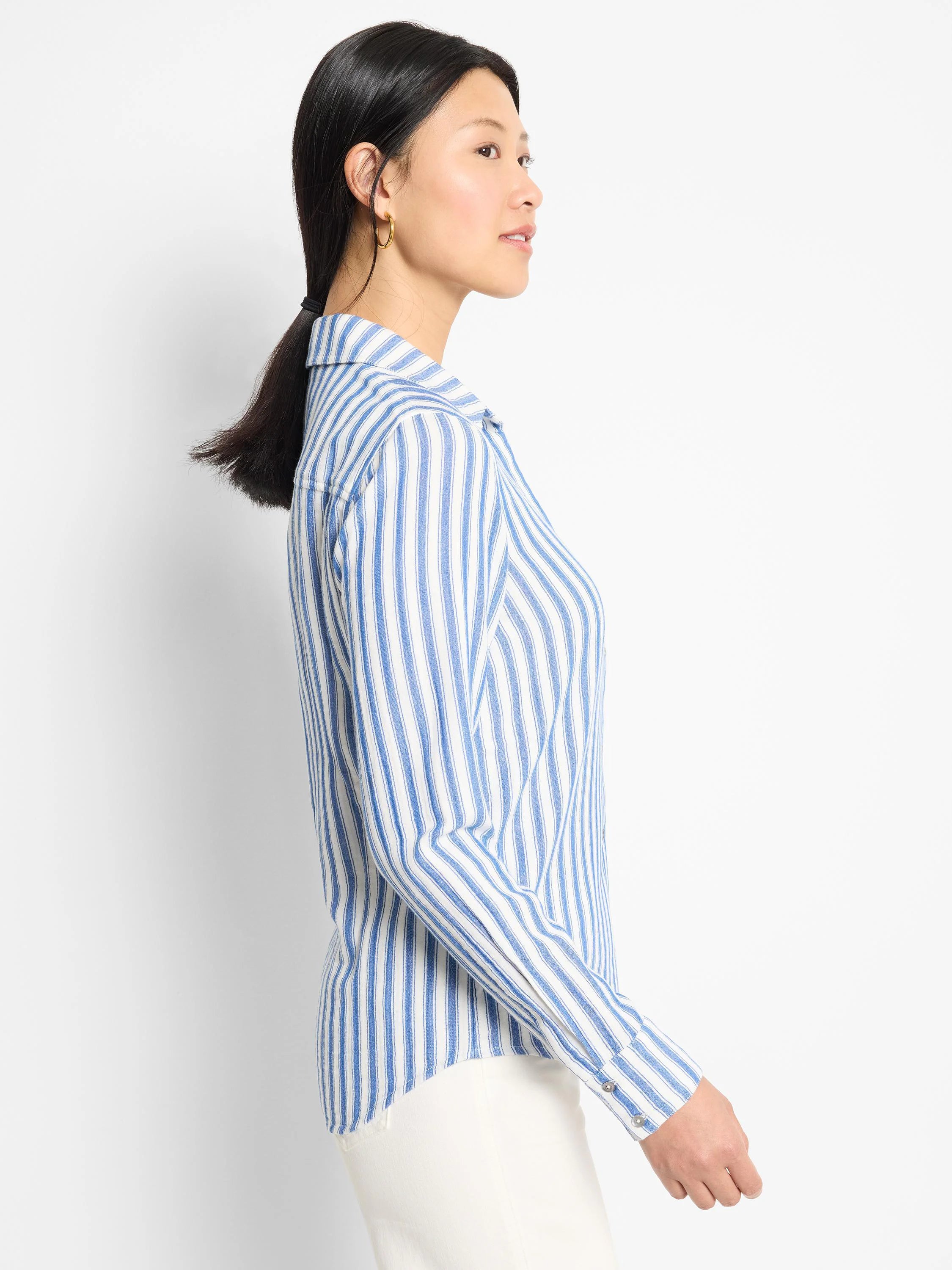 White and blue striped, long-sleeve collared shirt.