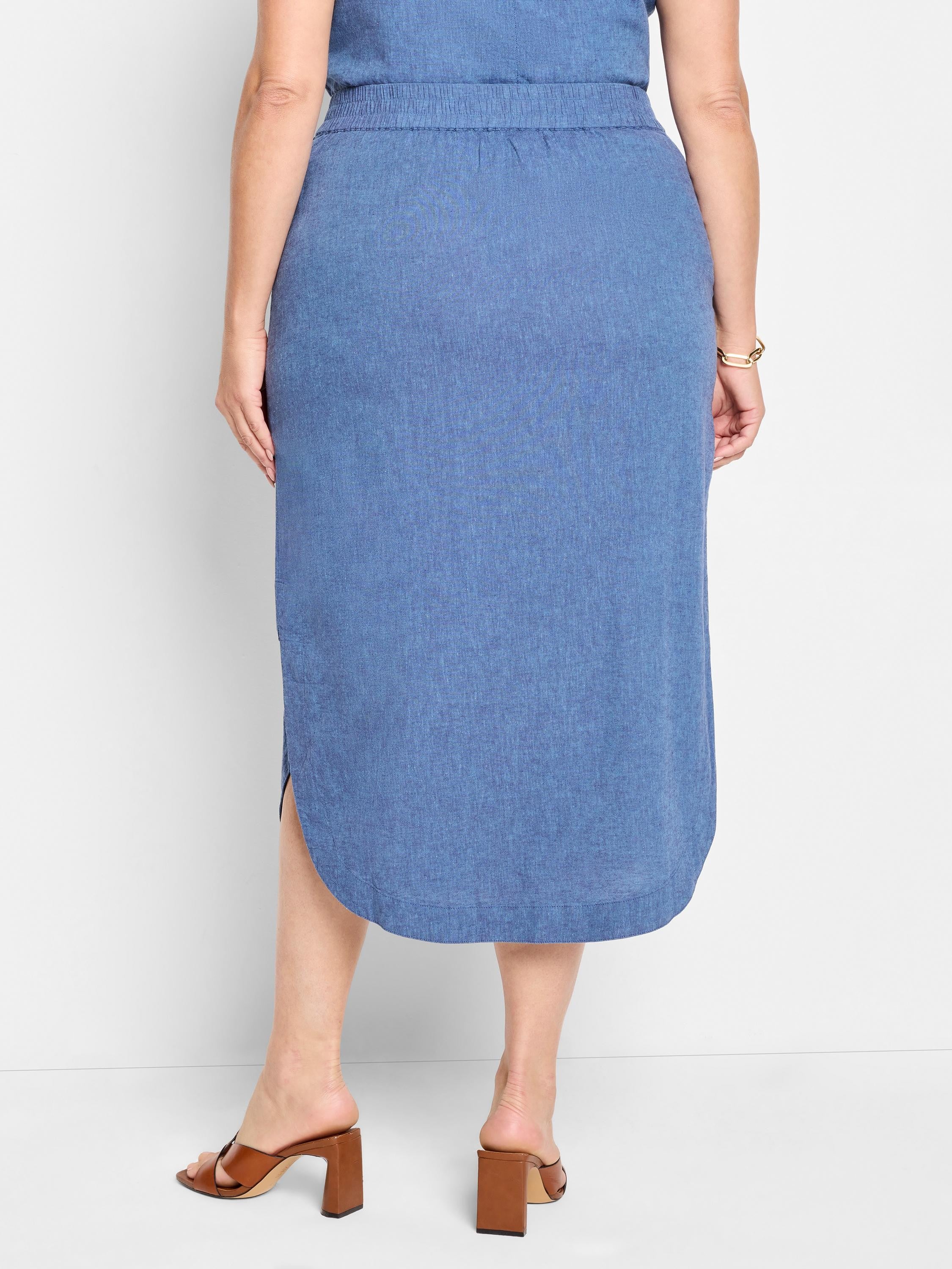 Blue linen midi skirt; curved hem, elastic waistband.