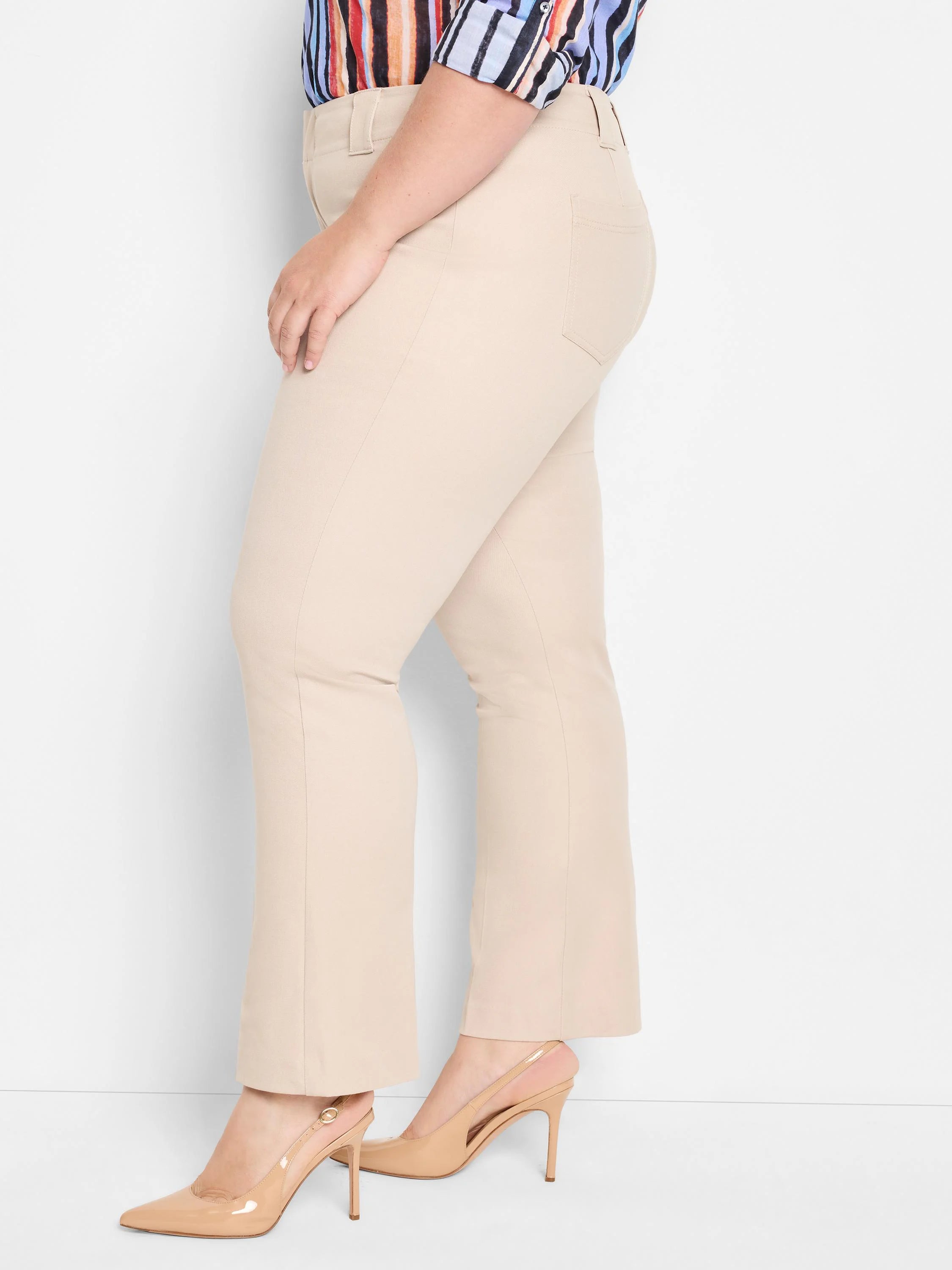 Light beige demi boot pants. Features belt loops, flat front, and subtle back pockets.