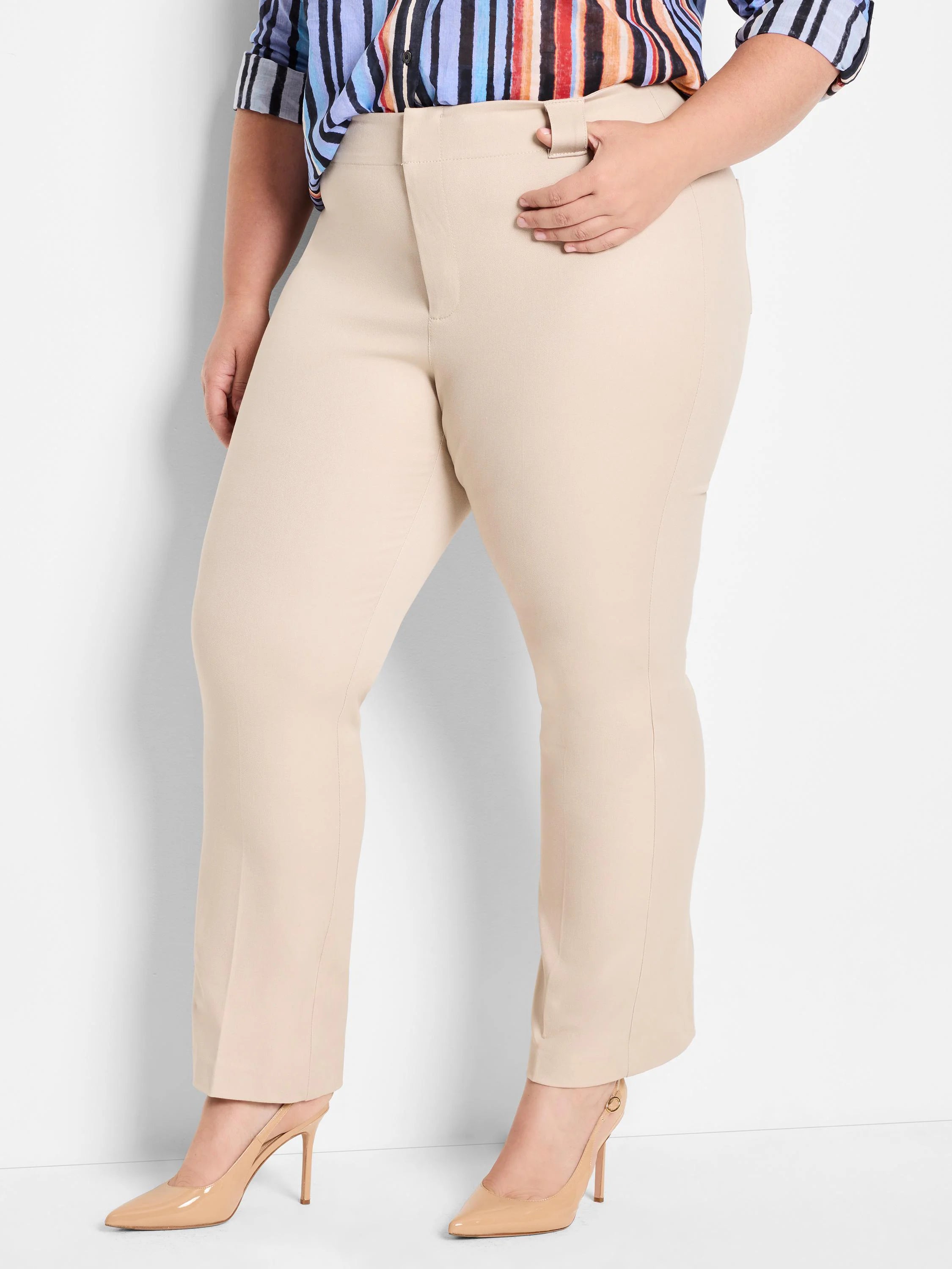 Light beige, flat front demi boot-cut pants, ankle length with a subtle flare.