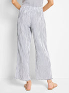 Here's alt text for the image, under 125 characters:

"Wide-leg pants; white with thin, dark blue pinstripes; elastic...