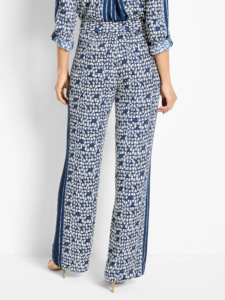 Wide-leg pants; navy blue and white geometric print, with vertical stripes along the sides.