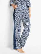 Wide-leg pants in navy blue and white geometric print.  Side panel in darker blue.