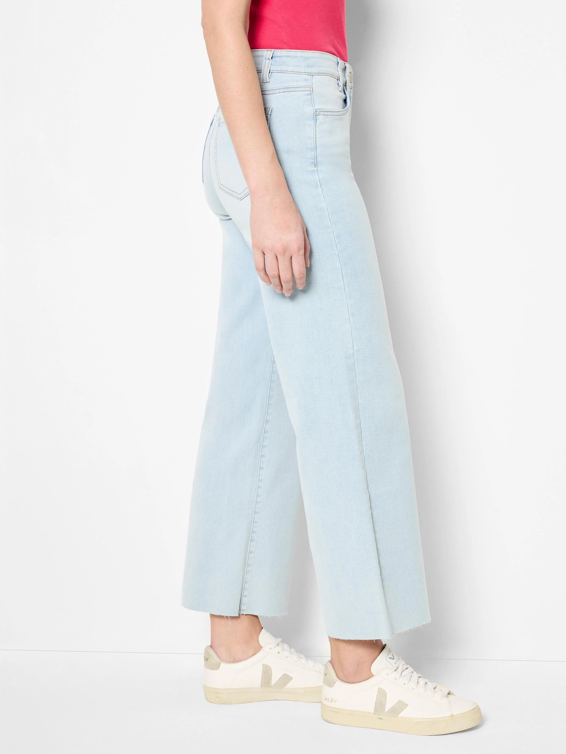 Light blue, wide-leg, cropped jeans with a raw hem.