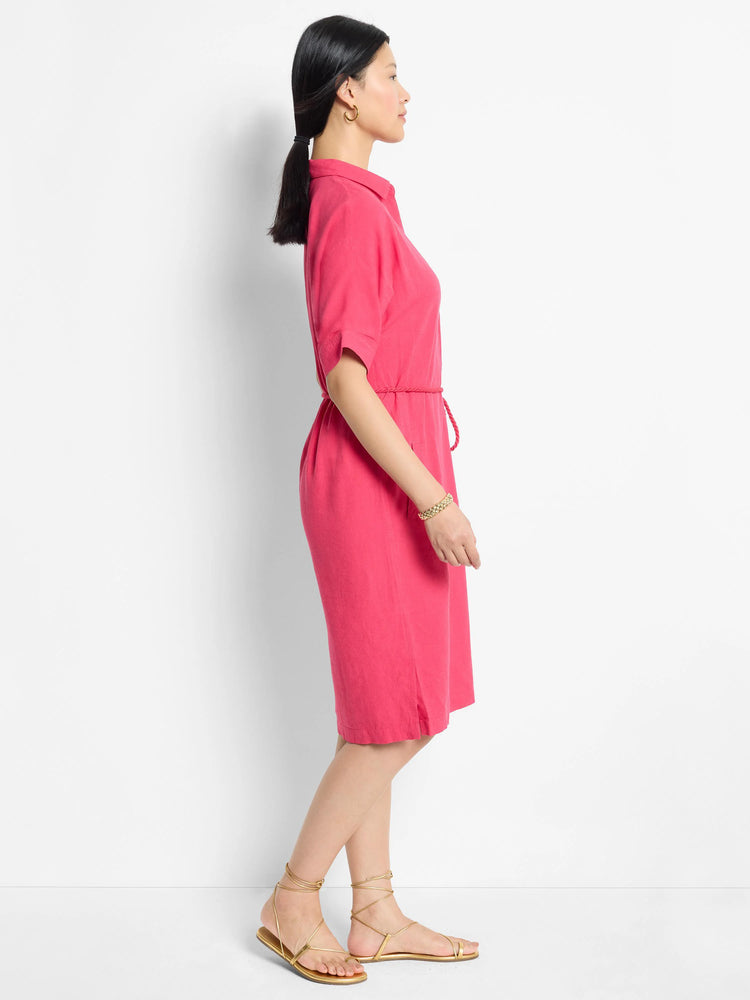 Pink linen midi dress, short sleeves, belted waist.  Side view.