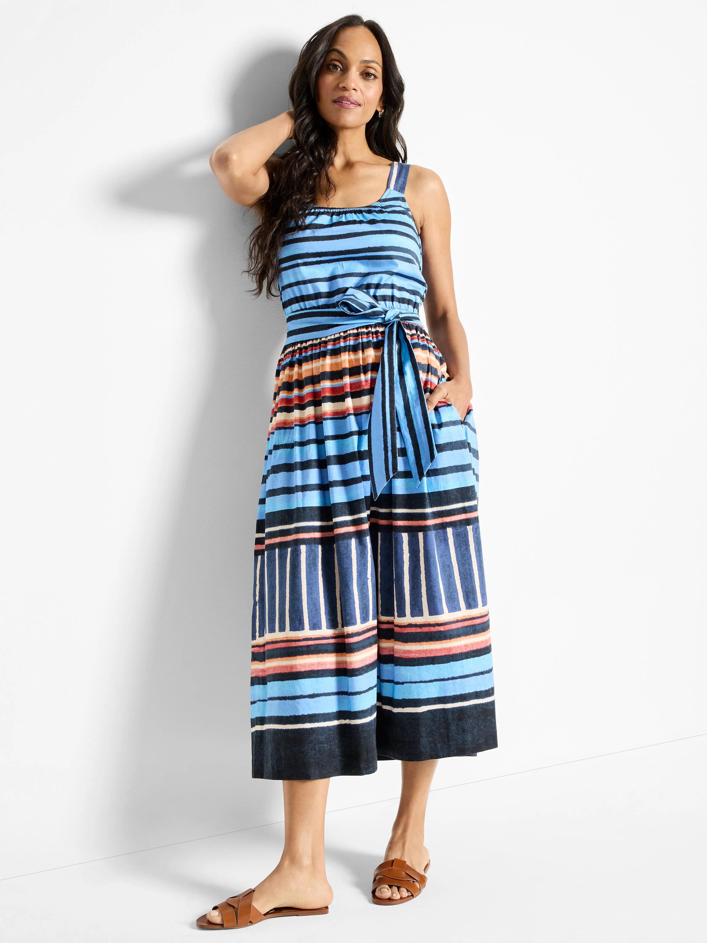 Blue, black, orange, and red horizontal stripes on a sleeveless midi dress with a self-tie belt.  Features pockets.