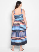 Midi-length sleeveless dress, horizontal stripes in blue, orange, and dark-navy.  The straps are thin and the bodice is...