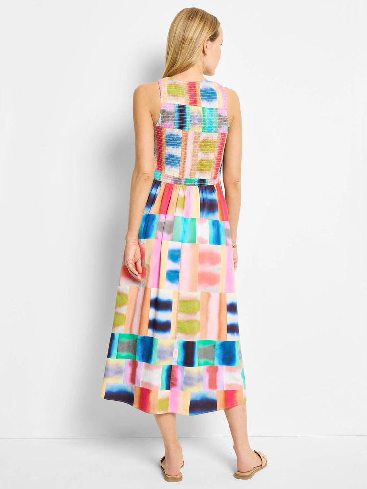 Midi sleeveless dress, multicolored abstract block print in blues, pinks, oranges, and greens.  Back view.
