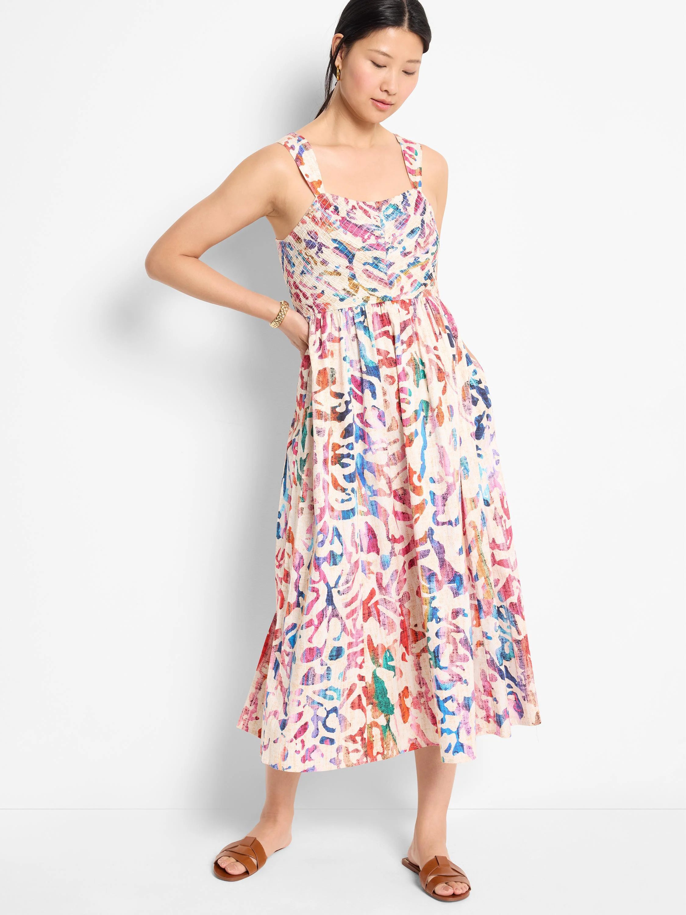 Midi dress, off-white base with multicolored abstract print (pink, blue, orange).  Square neck, thin straps.