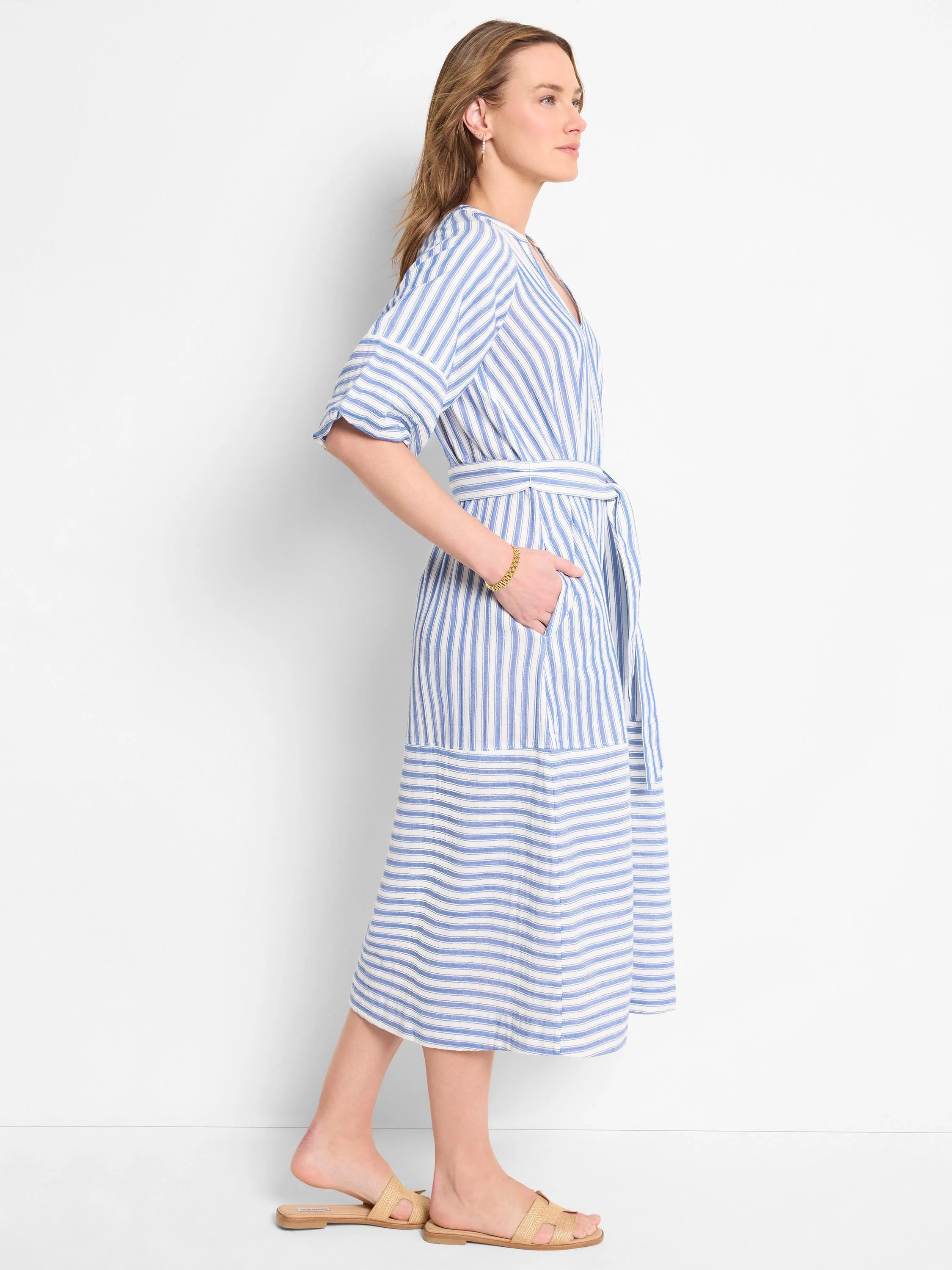 Blue and white vertical striped midi dress with a self-tie belt.  Three-quarter sleeves.