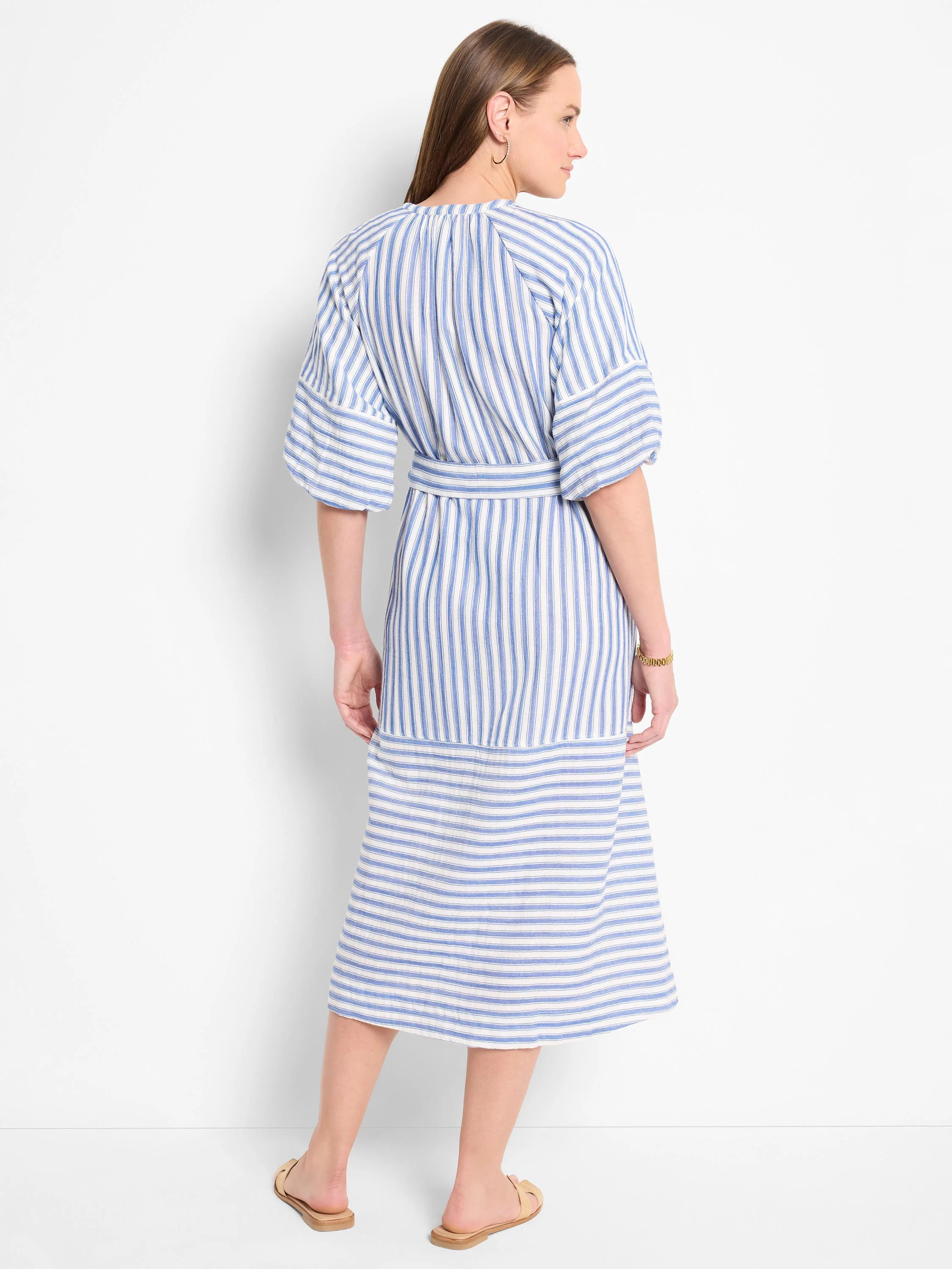 Blue and white vertical striped midi dress with short sleeves and a belted waist.