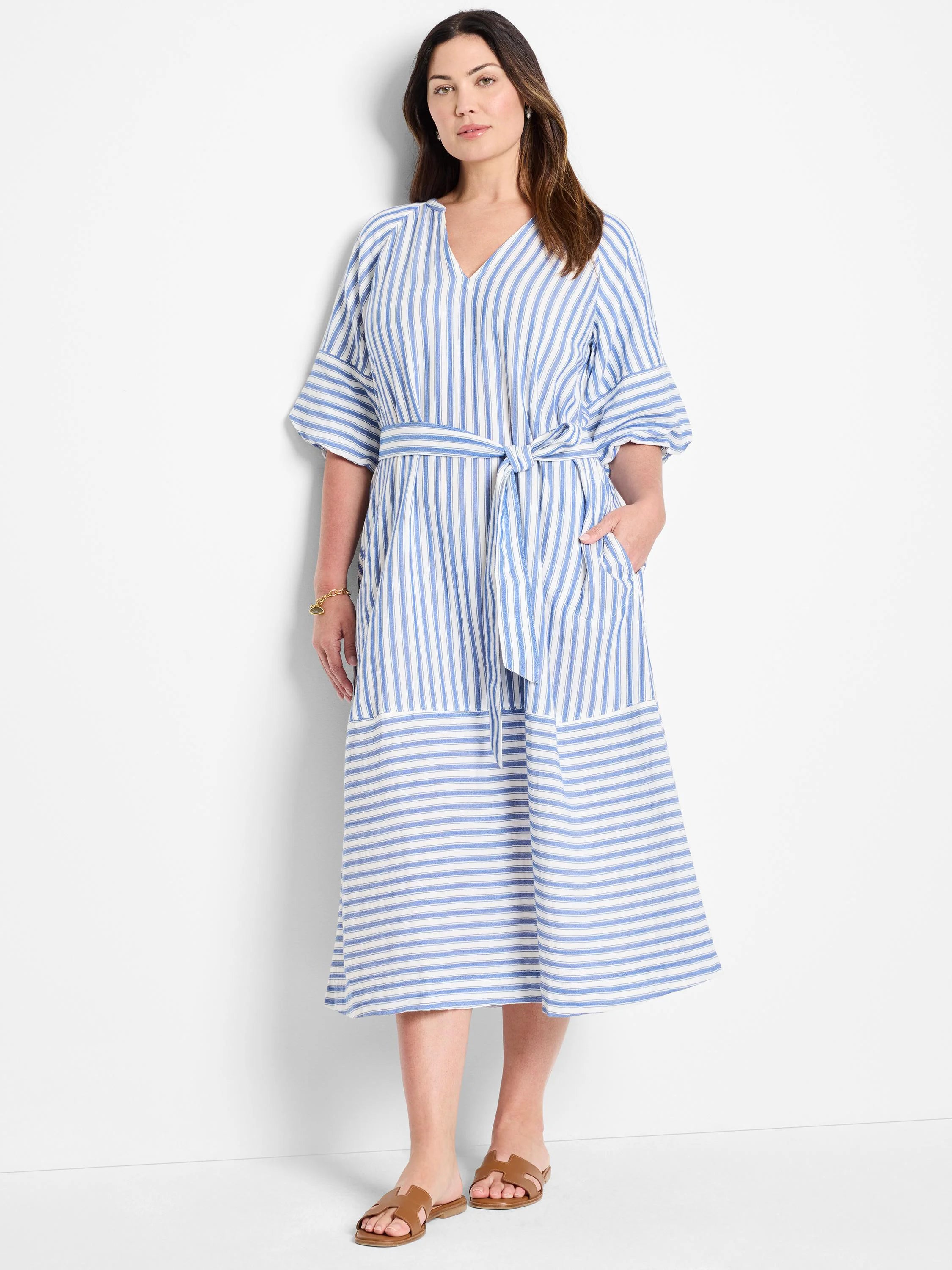 Blue and white striped midi dress with a V-neck, short sleeves, pockets, and a self-tie belt.